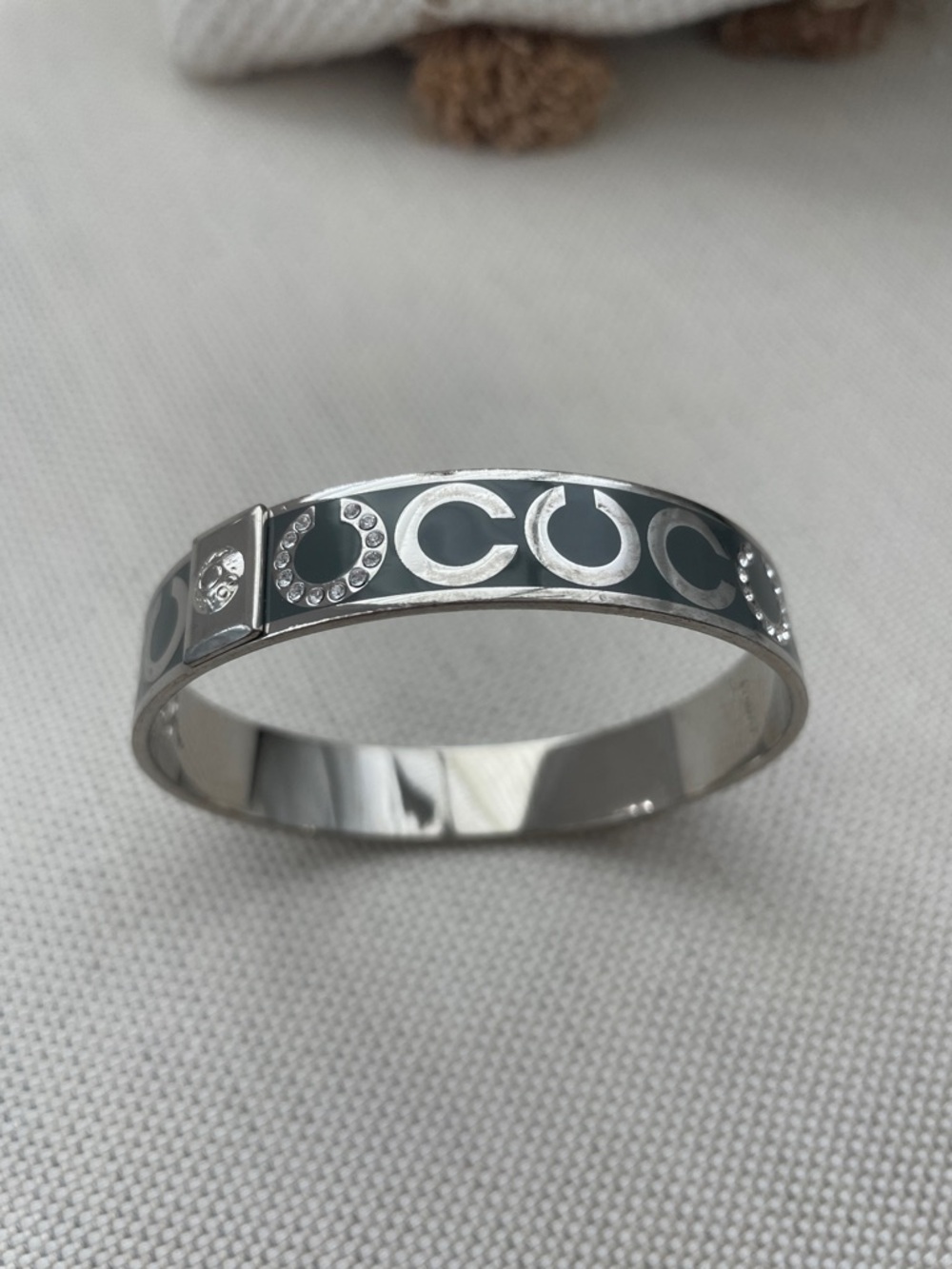 Coach Gray and Silver Bangle with Faux Diamond Accents